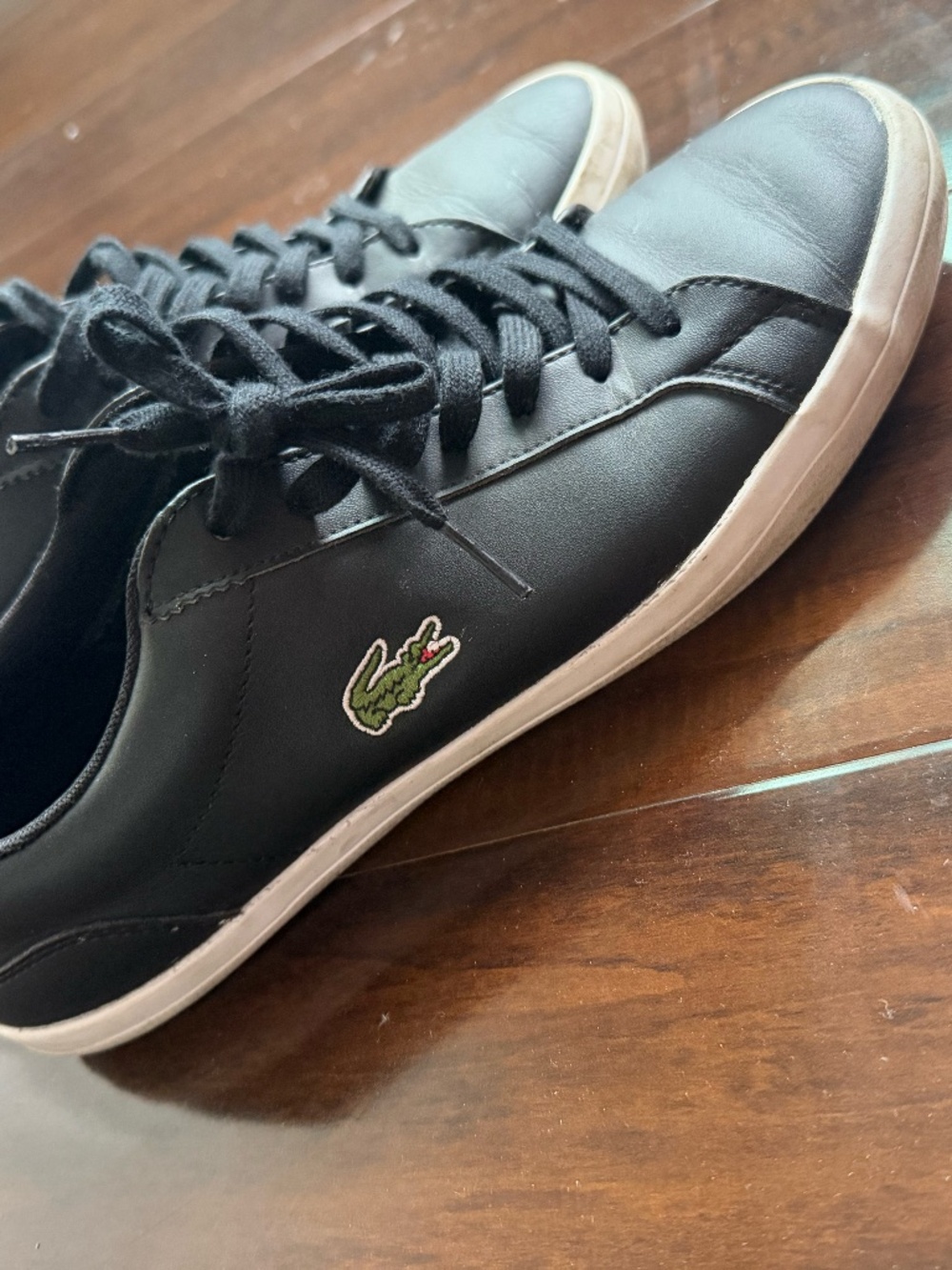 Lacoste shoes in black and worn once like brand new
